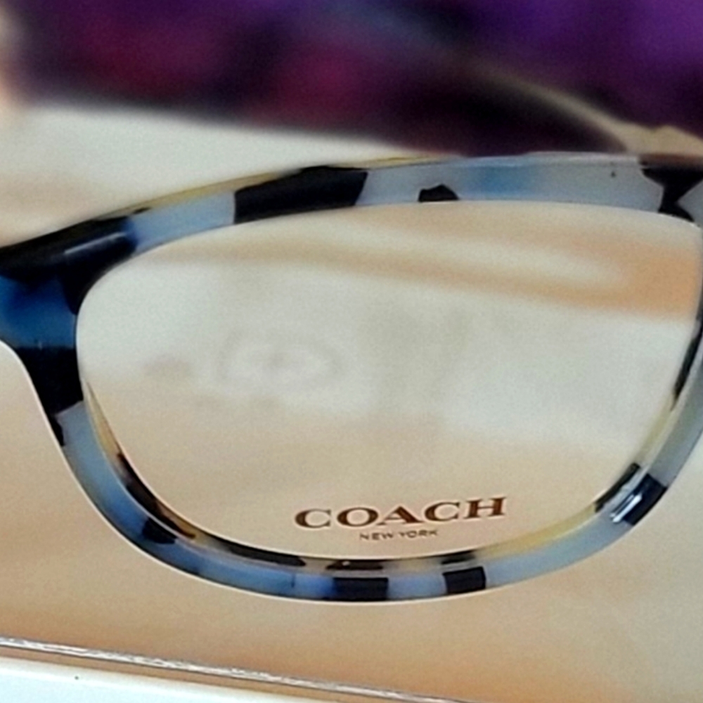 Coach Authentic Frame with cerial number still attached.